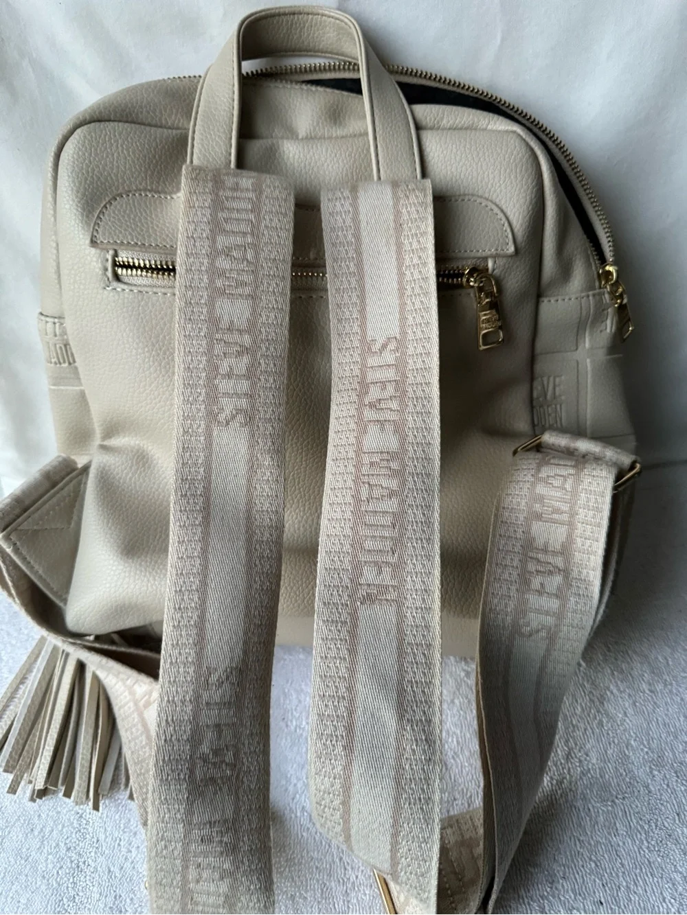 Steve Madden Cream Quilted Logo Backpack with Tassel